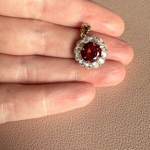 Radiant Gold and Red Gemstone necklace made in a Freida Rothman factory